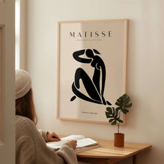 Matisse Art Prints - Figurative Lady Poster Art featuring a seated woman silhouette in a minimalist interior.