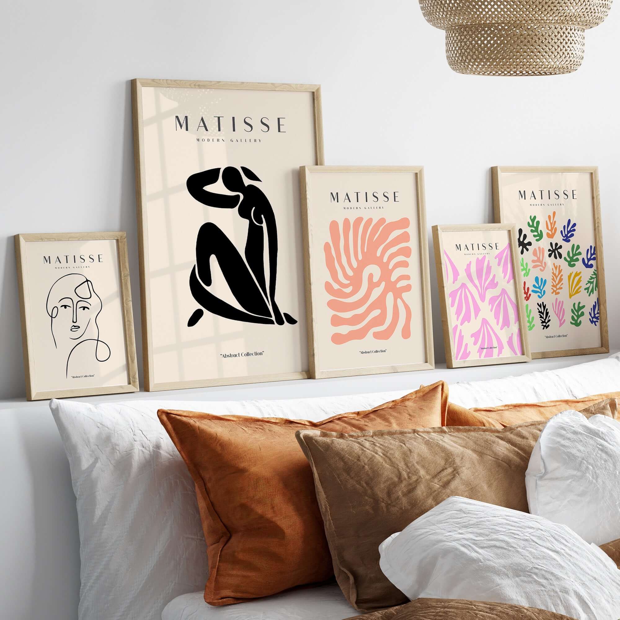 Matisse Art Prints - Figurative Lady Poster Art displayed on a wall with stylish accessories and pillows.
