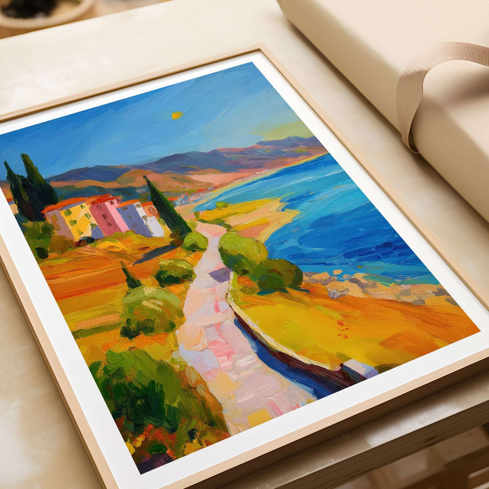 Matisse French Riviera Art Print | Mediterranean Landscape Poster displayed on a table with vibrant colors and coastal scenery.