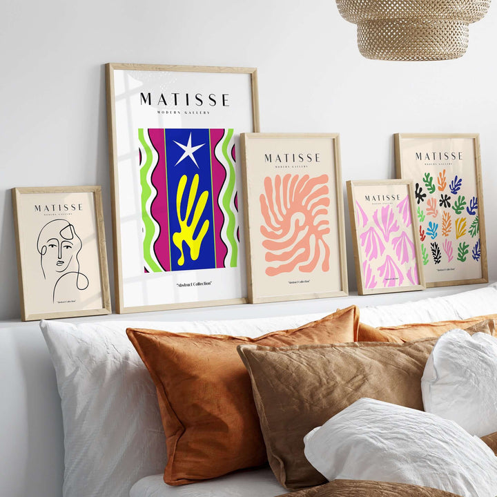 Matisse art prints displayed on a wall, featuring vibrant colors and abstract designs, including Jazz-inspired poster.
