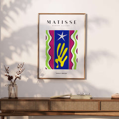 Matisse Art Prints - Jazz Abstract Star Hand Waves Poster displayed on a wooden console with decorative vase.