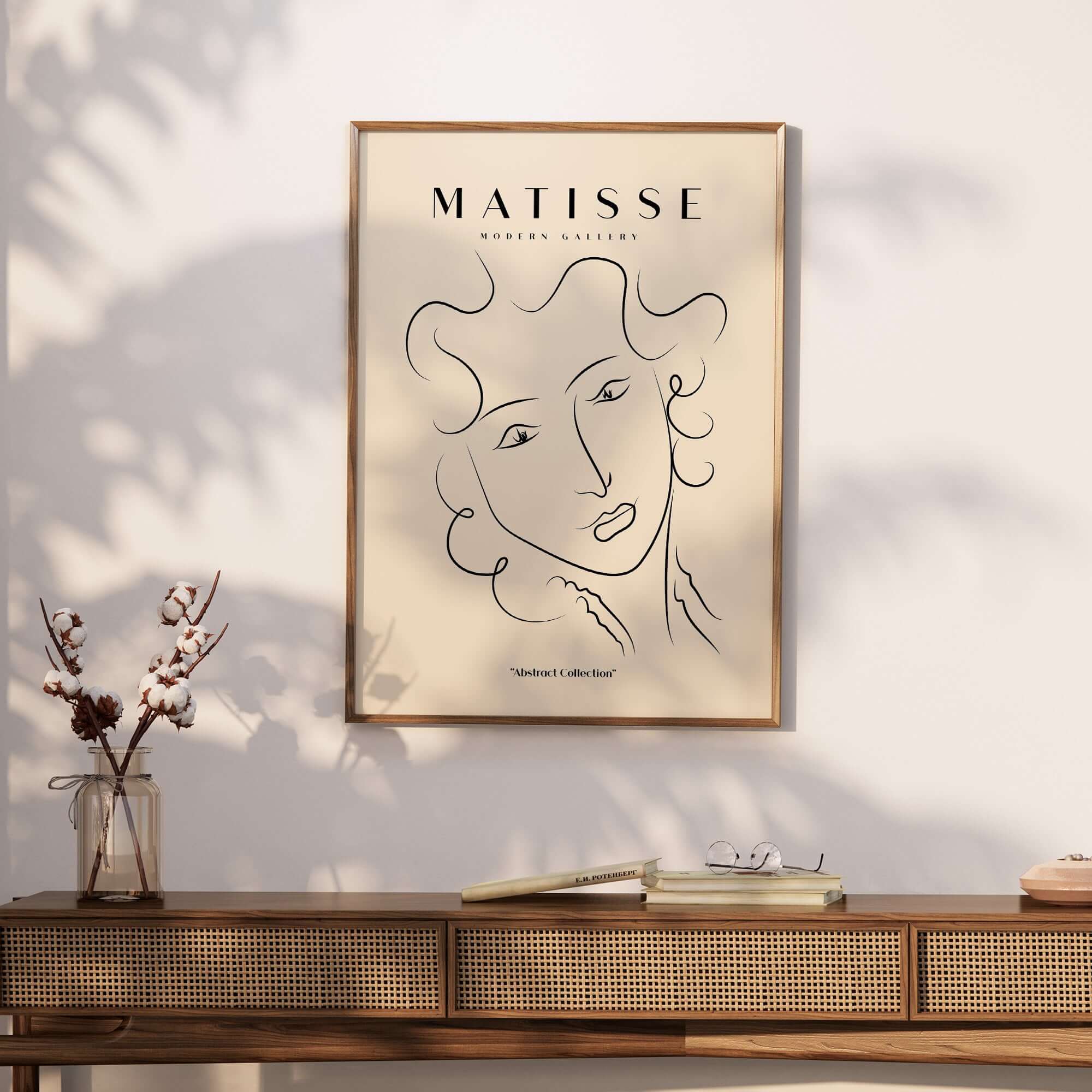 Matisse Art Prints -  Line Art Ladies Face with Wavy Hair Minimalist Poster displayed in a stylish interior setting.