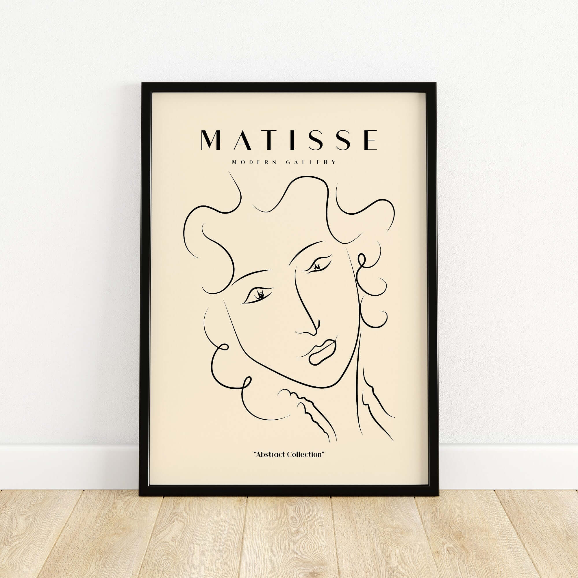 Matisse Art Prints -  Line Art Ladies Face with Wavy Hair Minimalist Poster framed on a beige wall.