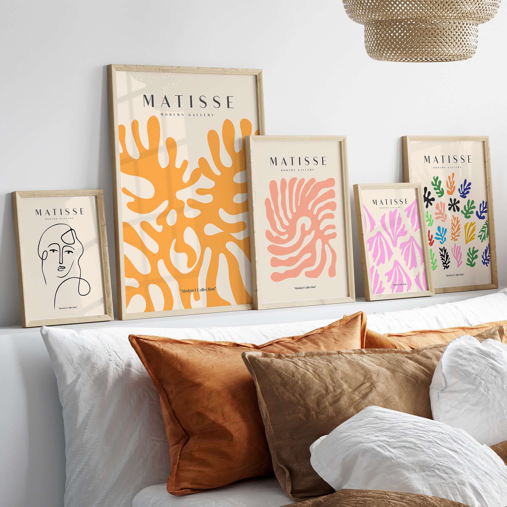 Matisse Art Prints - Orange Abstract Coral Pattern Poster displayed on a modern wall above stylish pillows.