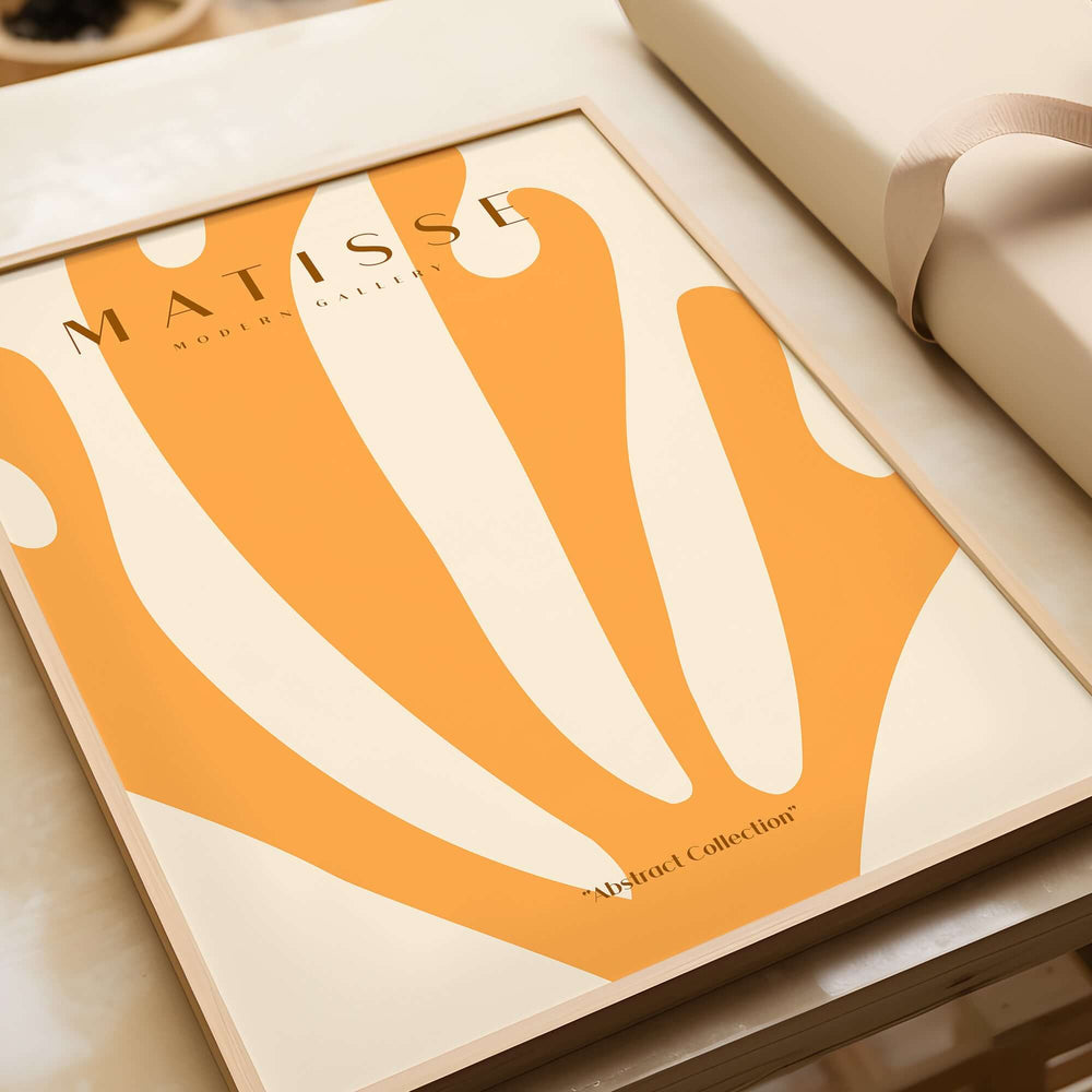 Matisse Art Prints - Orange Fan Coral Abstract Shape Poster featuring an abstract orange design on a beige background.