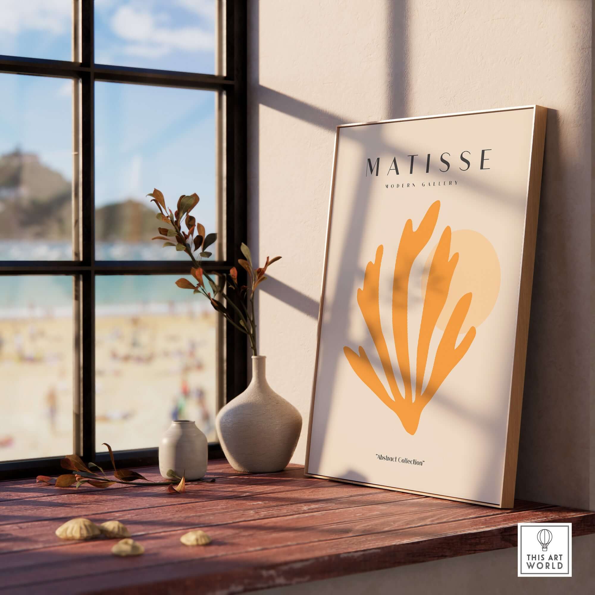Matisse Art Prints - Orange Seaweed Abstract Art Print displayed on a shelf with beach view outside the window.