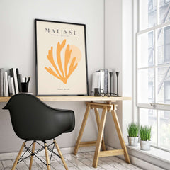 Matisse Art Prints - Orange Seaweed Abstract Art Print displayed on a wall above a desk in a modern setting.