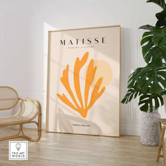 Matisse Art Prints - Orange Seaweed Abstract Art Print displayed in a modern gallery setting with neutral tones and plant.