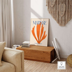 Matisse Papiers Découpés Orange Abstract Botanical Cut Out Art Print displayed in a modern interior setting.