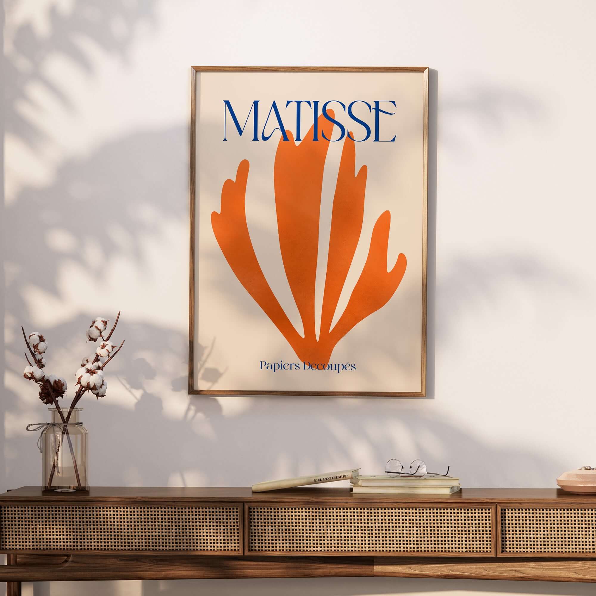 Matisse Papiers Découpés Orange Abstract Botanical Cut Out Art Print showcased on a stylish wall with elegant decor.