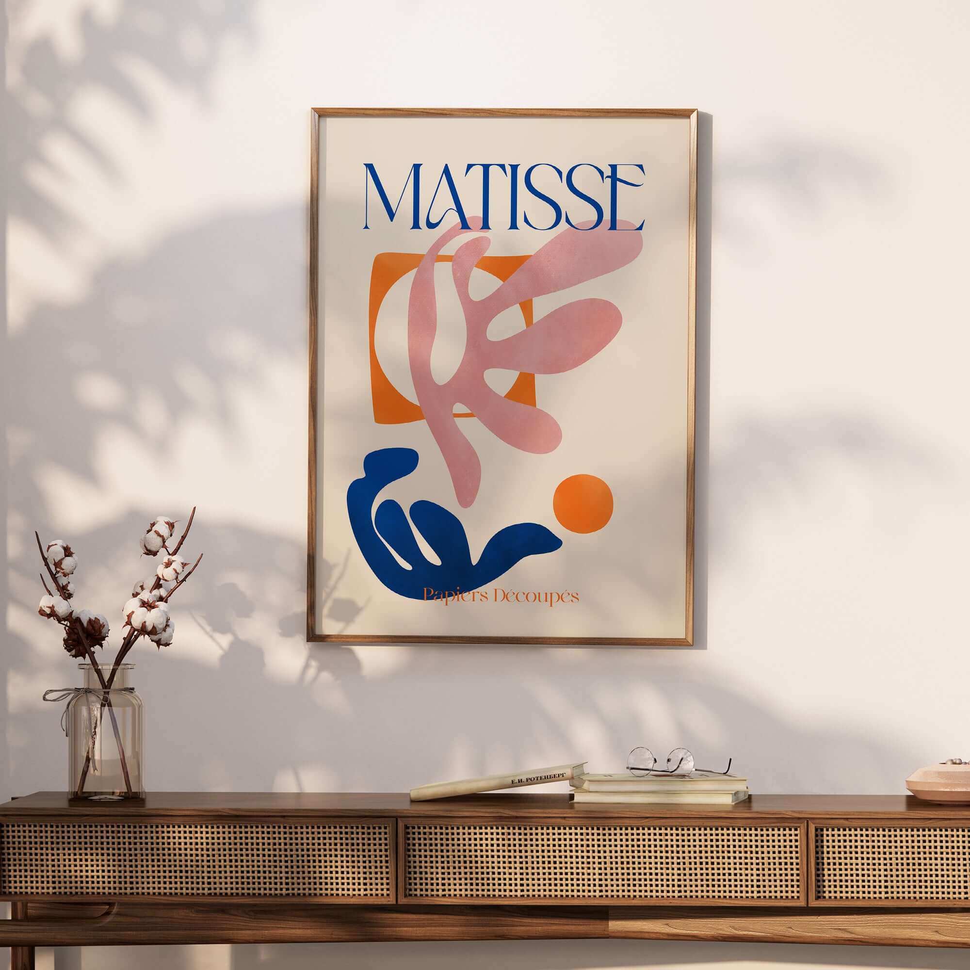 Matisse Papiers Découpés Pink Blue Abstract Art Print displayed on a wall, showcasing vibrant colors and dynamic shapes.