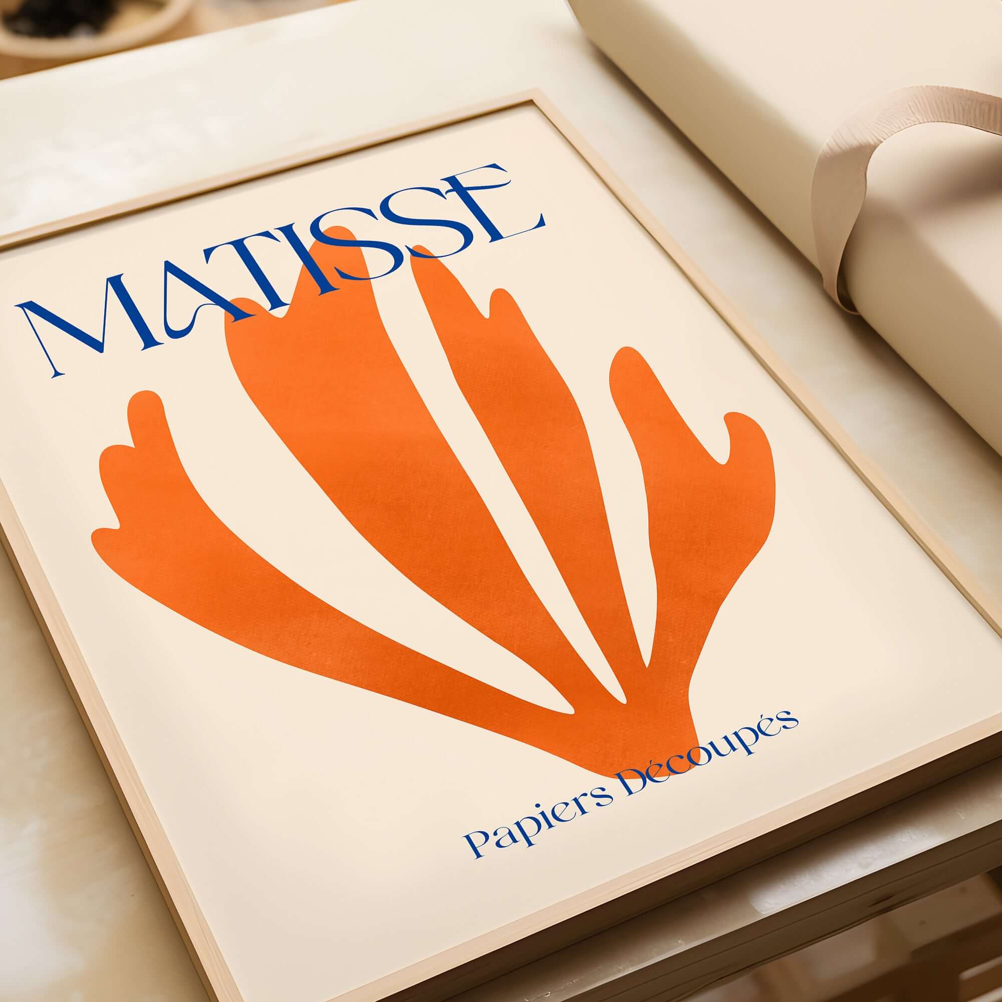 Matisse Papiers Découpés Orange Abstract Botanical Cut Out Art Print featuring an orange fan shape on a beige background.