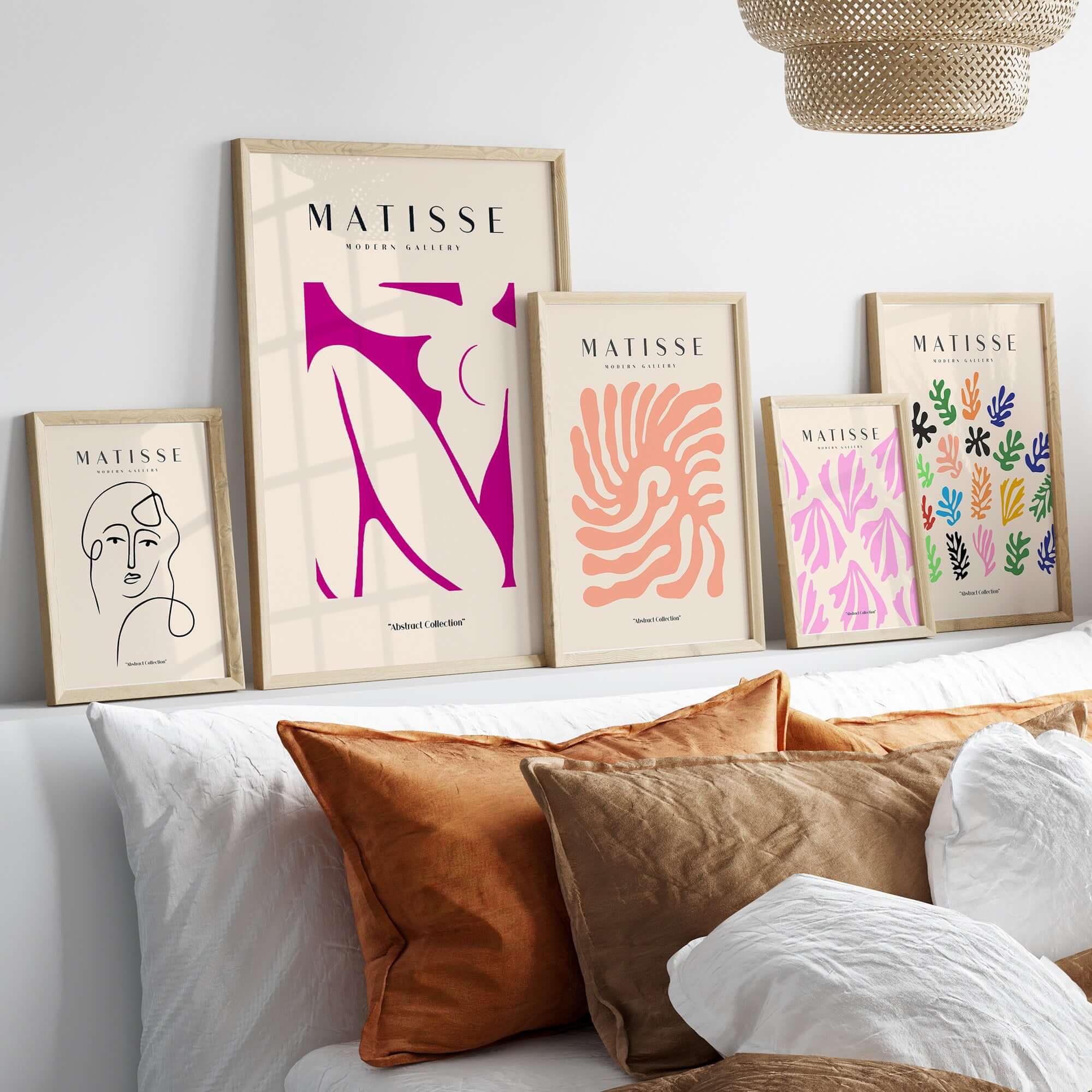 Matisse Art Prints - Pink Abstract Nude Figure Art Print displayed on a wall with modern decor and vibrant colors.