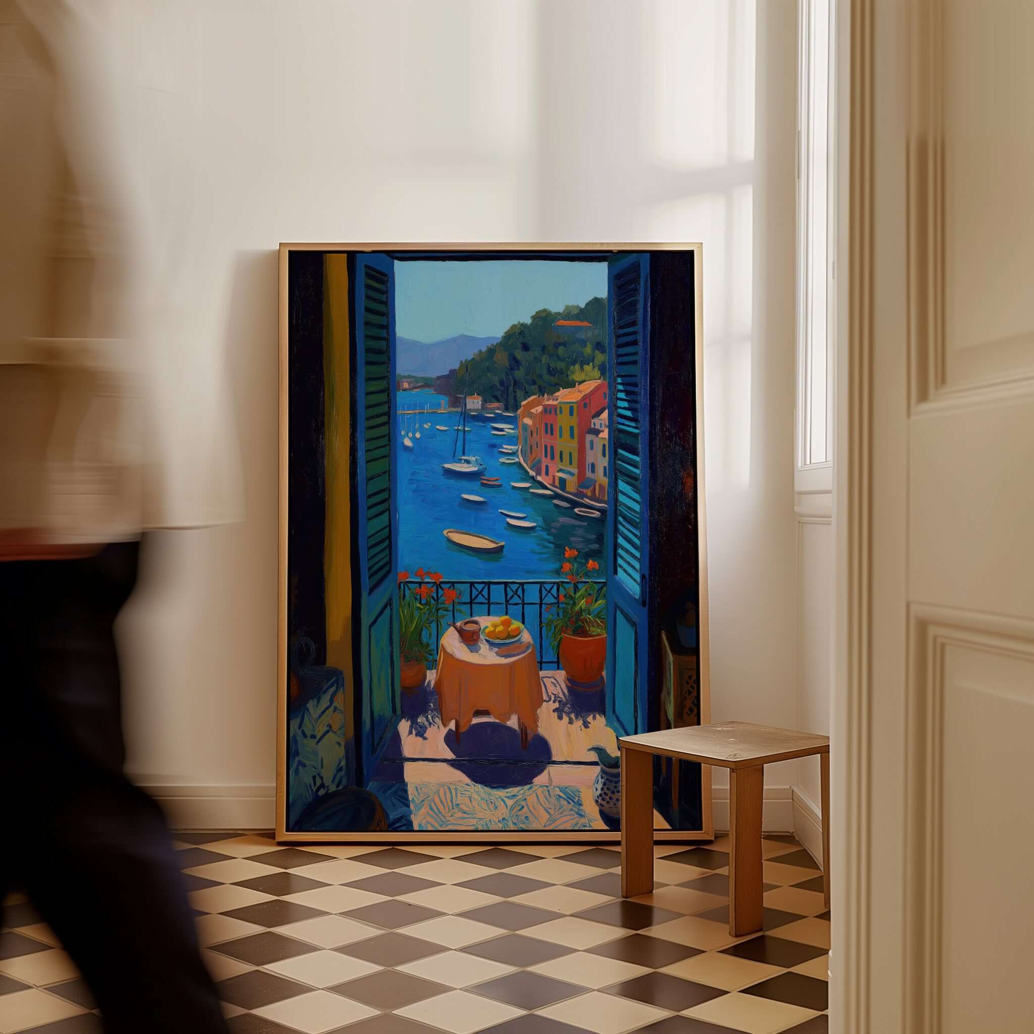 Matisse Portofino Balcony Art Print | Italian Harbour Village Poster displayed near a wooden chair in an elegant interior.