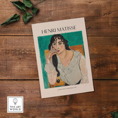 Matisse Poster  - Laurette with a White Blouse 1917 Art Print featuring a woman in contemplation against a green background.