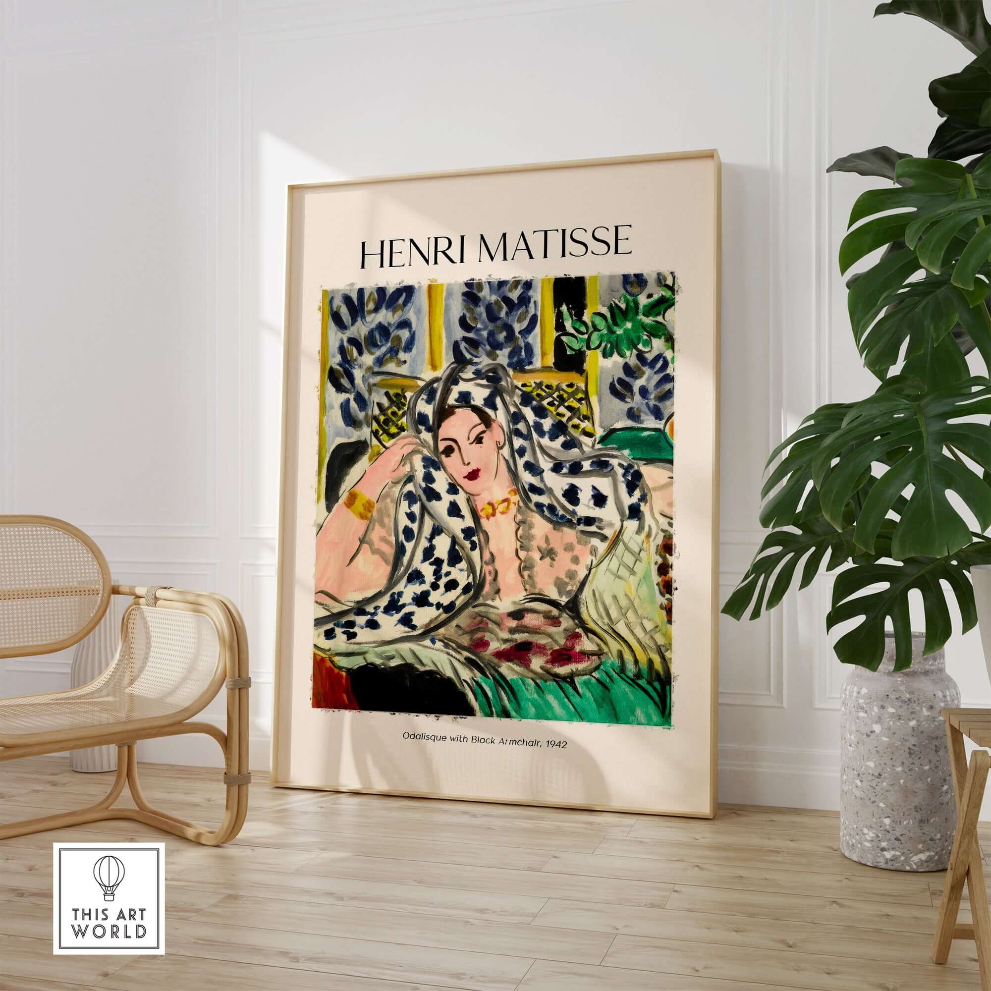 Matisse Poster  - Odalisque with Black Armchair 1942 Art Print displayed in a contemporary living room setting.