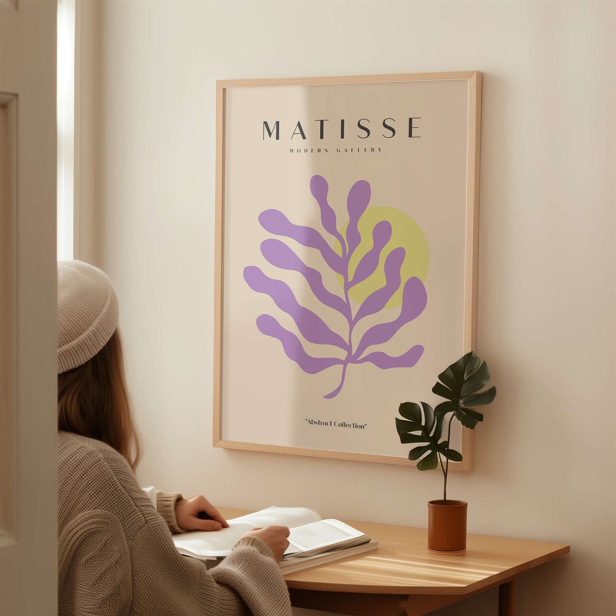 Matisse Art Prints - Purple Botanical Abstract Poster displayed in a modern interior, adding artistic flair to the space.