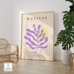Matisse Art Prints - Purple Botanical Abstract Poster displayed in a modern setting with a palm plant.