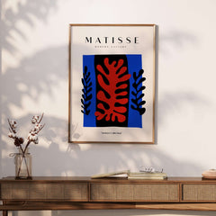 Matisse Art Prints -  Red Coral Black Leaves Blue Frame Poster displayed in modern decor.