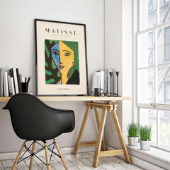 Matisse Art Prints - Split Face Blue Yellow Portrait Poster displayed on a wall in a modern workspace.