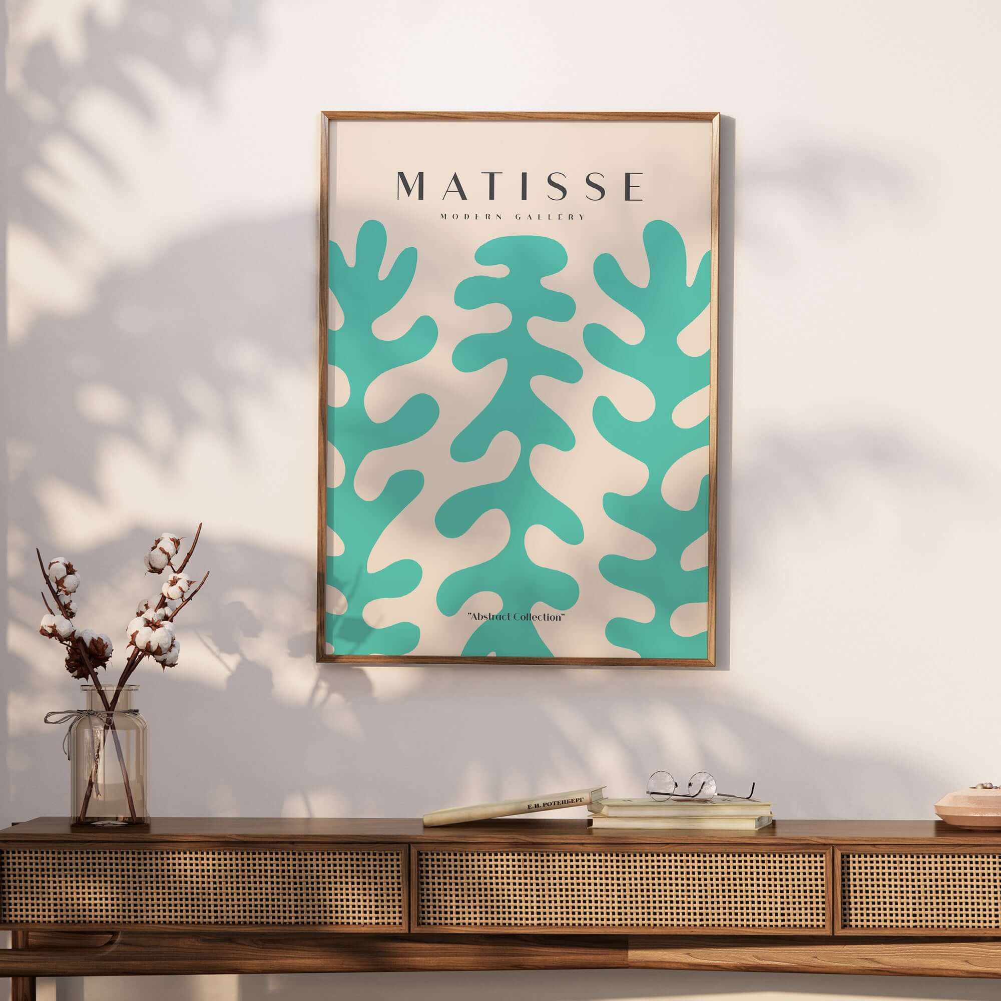 Matisse Art Prints - Teal Coral Pattern Abstract Wall Art displayed in a modern interior setting on a wooden table.