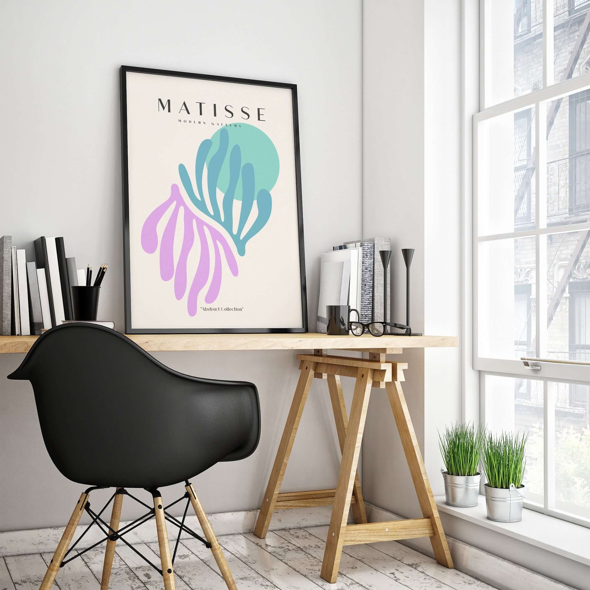 Matisse Art Prints -Teal Pink Abstract Leaves Sun Poster displayed in modern workspace with stylish chair and plants.