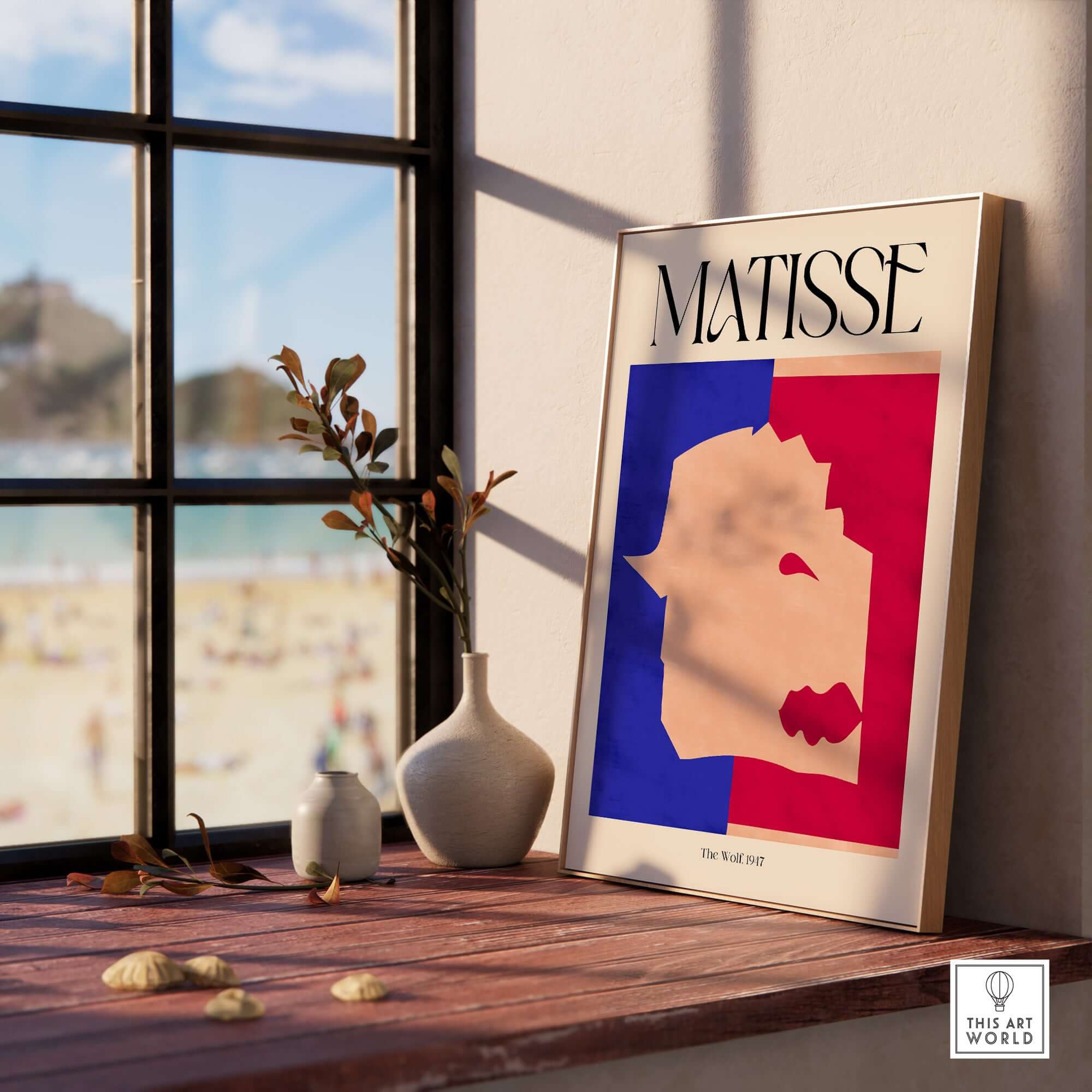 Matisse The Wolf 1947 Papiers Découpés Poster Print displayed in a modern interior setting with beach view.