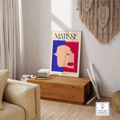 Matisse The Wolf 1947 Papiers Découpés Poster Print displayed in a modern living space, featuring bold colors and abstract design.