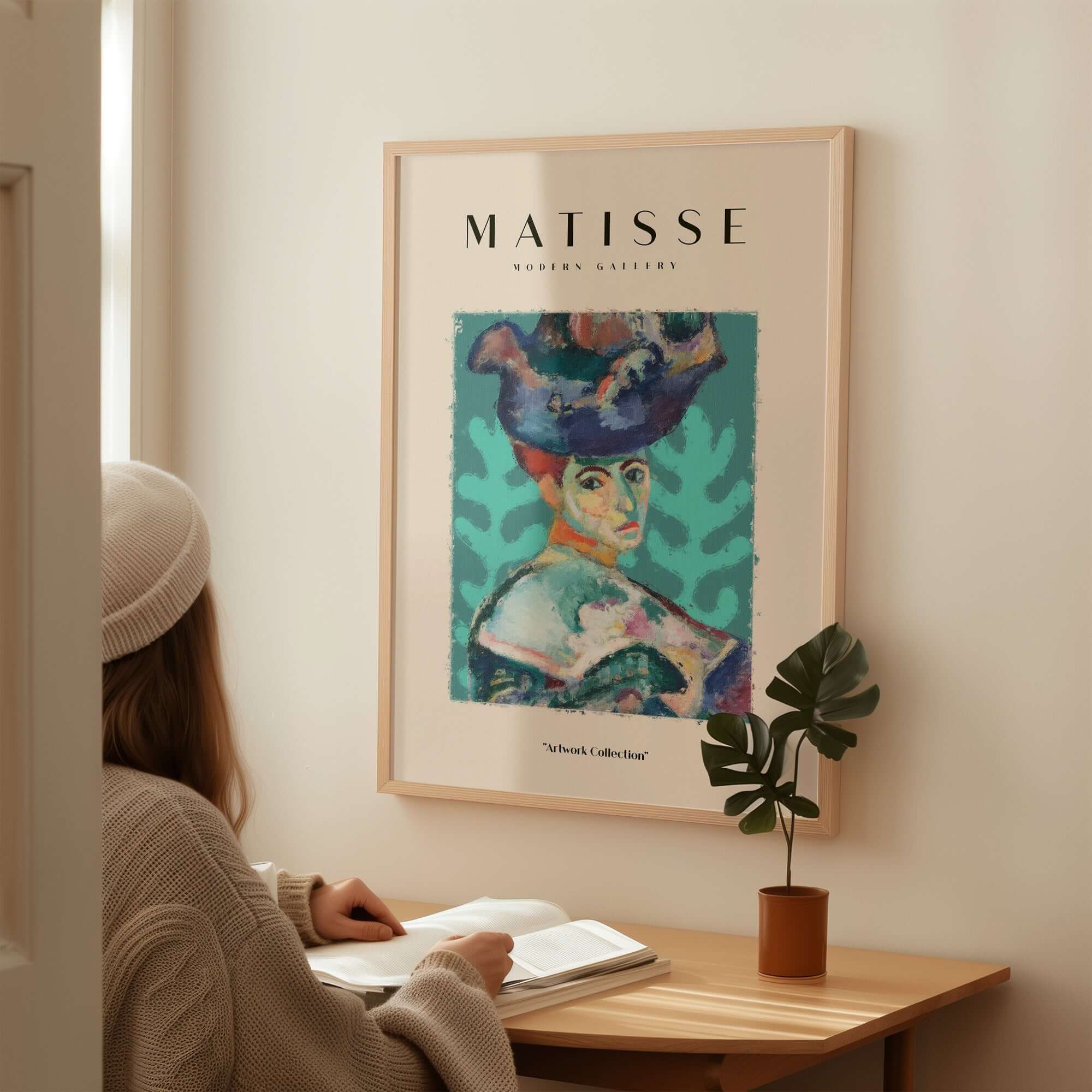 Matisse Art Prints - Woman Large Hat Portrait Teal Background Poster displayed in a stylish room setting.