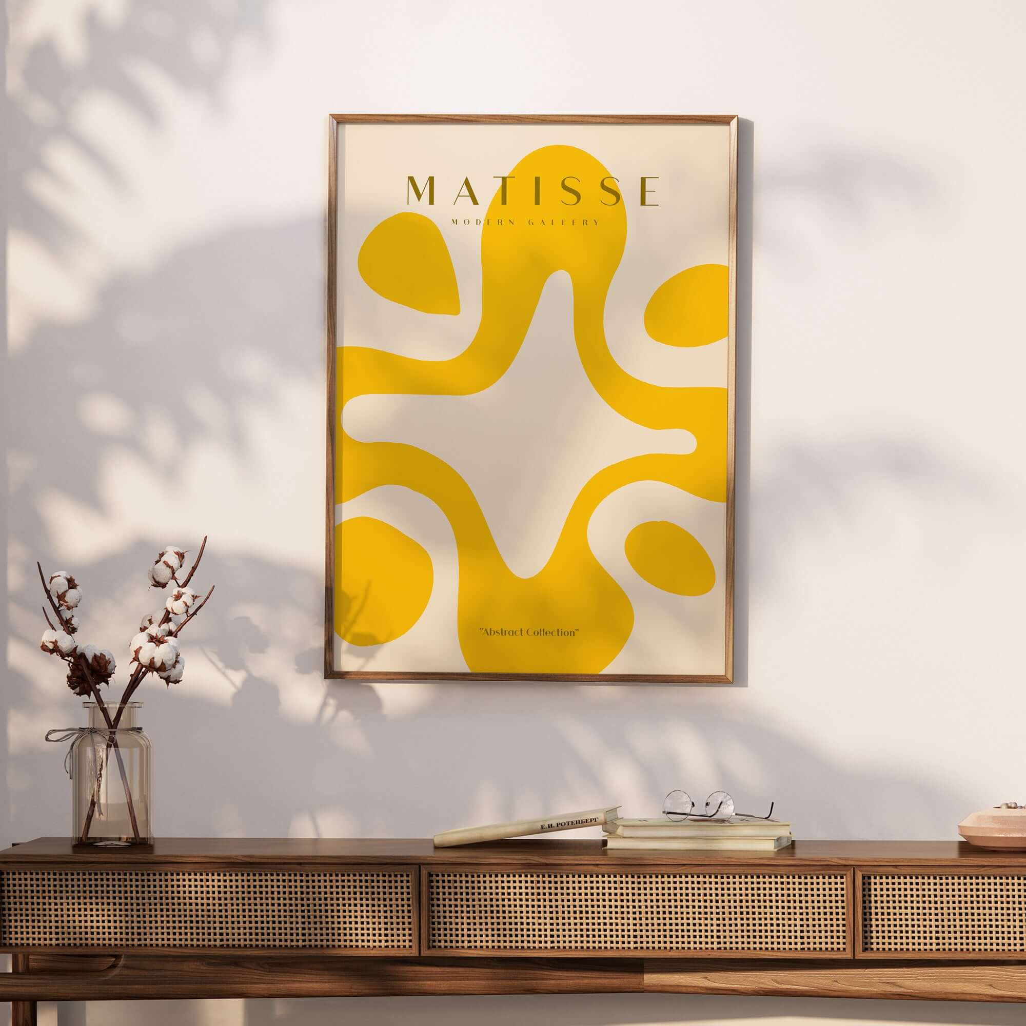 Matisse Art Prints -   Yellow Abstract Fluid Shape Poster displayed in a stylish interior setting with bright yellow designs.