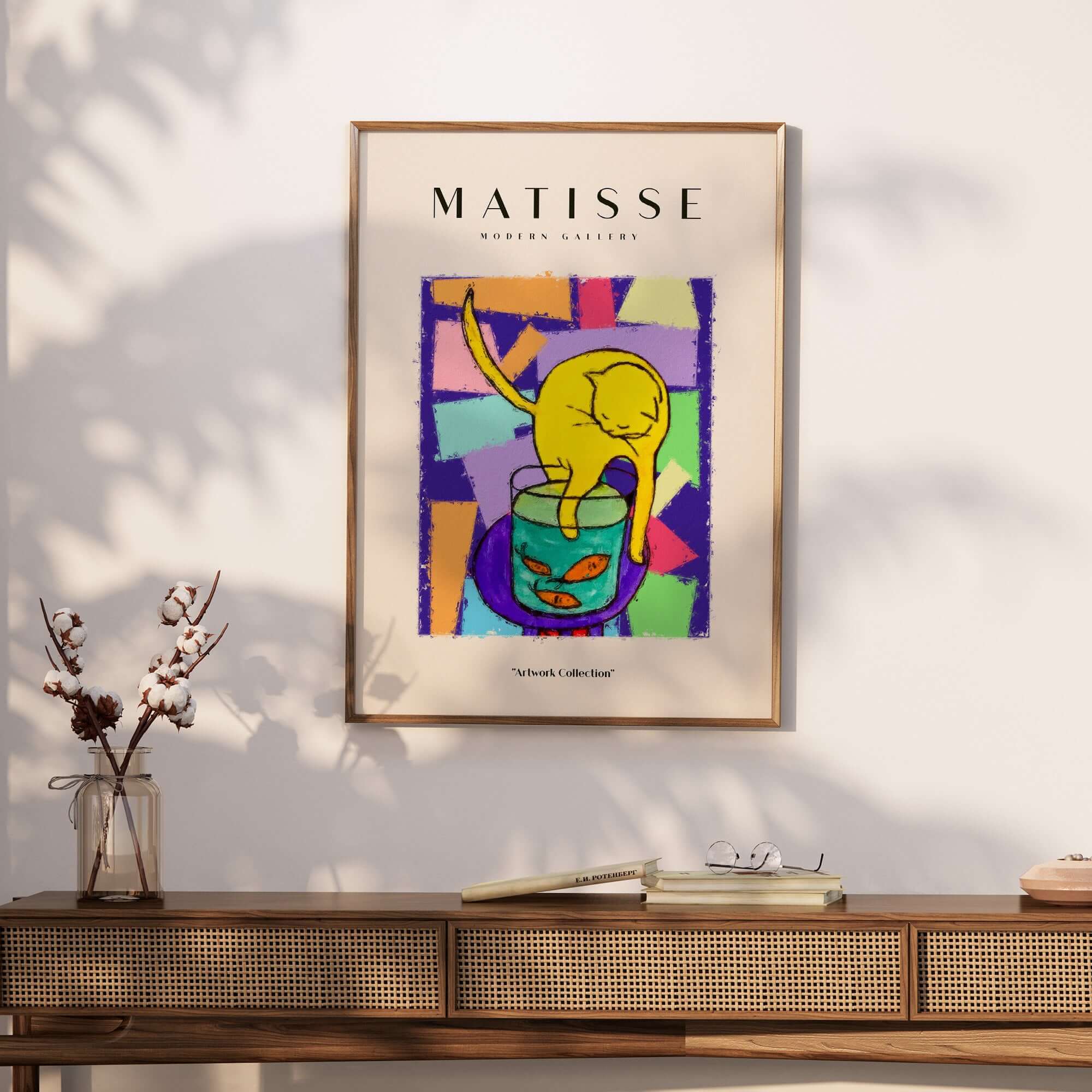 Matisse Art Prints - Yellow Cat with Fishbowl Geometric Poster displayed on a wall above a wooden console table.