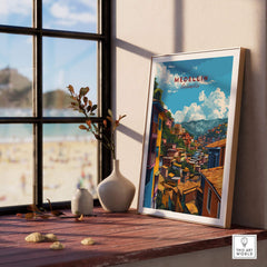 Medellin Travel Poster - Colombia displayed on a wooden table with a beach view, showcasing vibrant Colombian art.