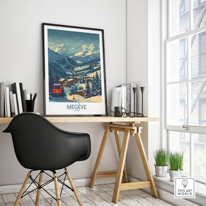 Megève ski poster displayed on a desk in a modern room with a view, featuring vibrant winter scenery of snowy mountains and ski lifts.