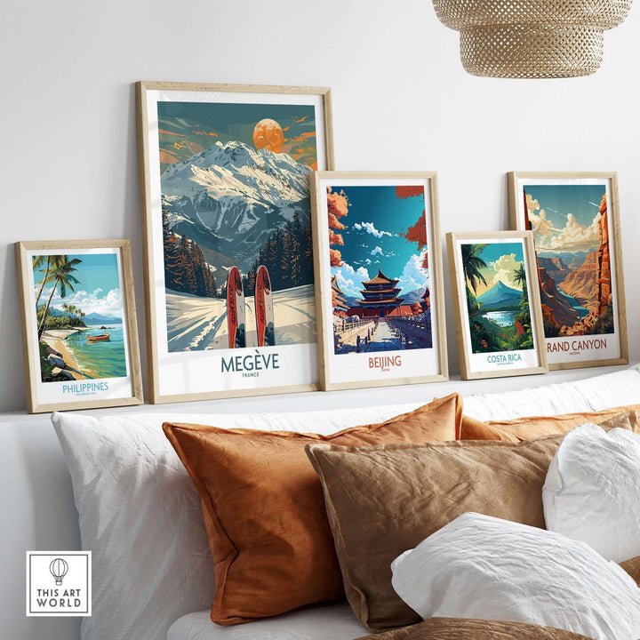 Framed travel art prints featuring Megève, Beijing, Costa Rica, and the Grand Canyon displayed in a cozy interior setting.