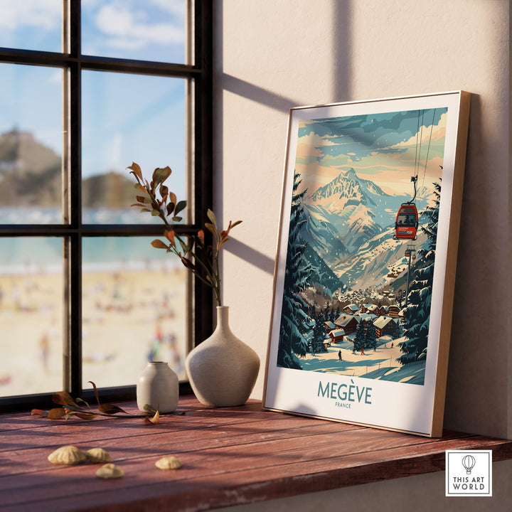 Megève ski poster wall art displayed on a windowsill with mountain scenery in a stylish frame.