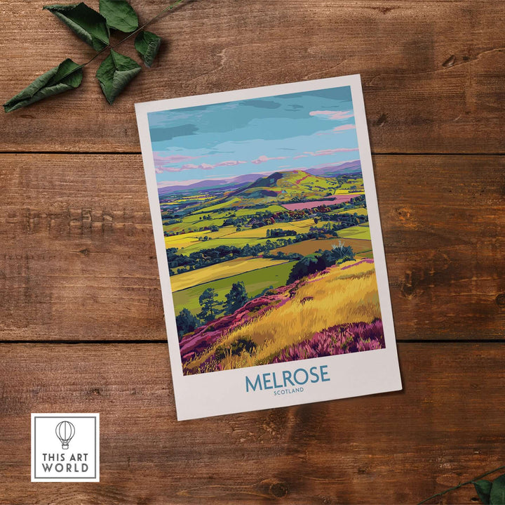 Melrose Scotland Eildon Hills travel print showcasing colorful landscape and fields under a bright blue sky.