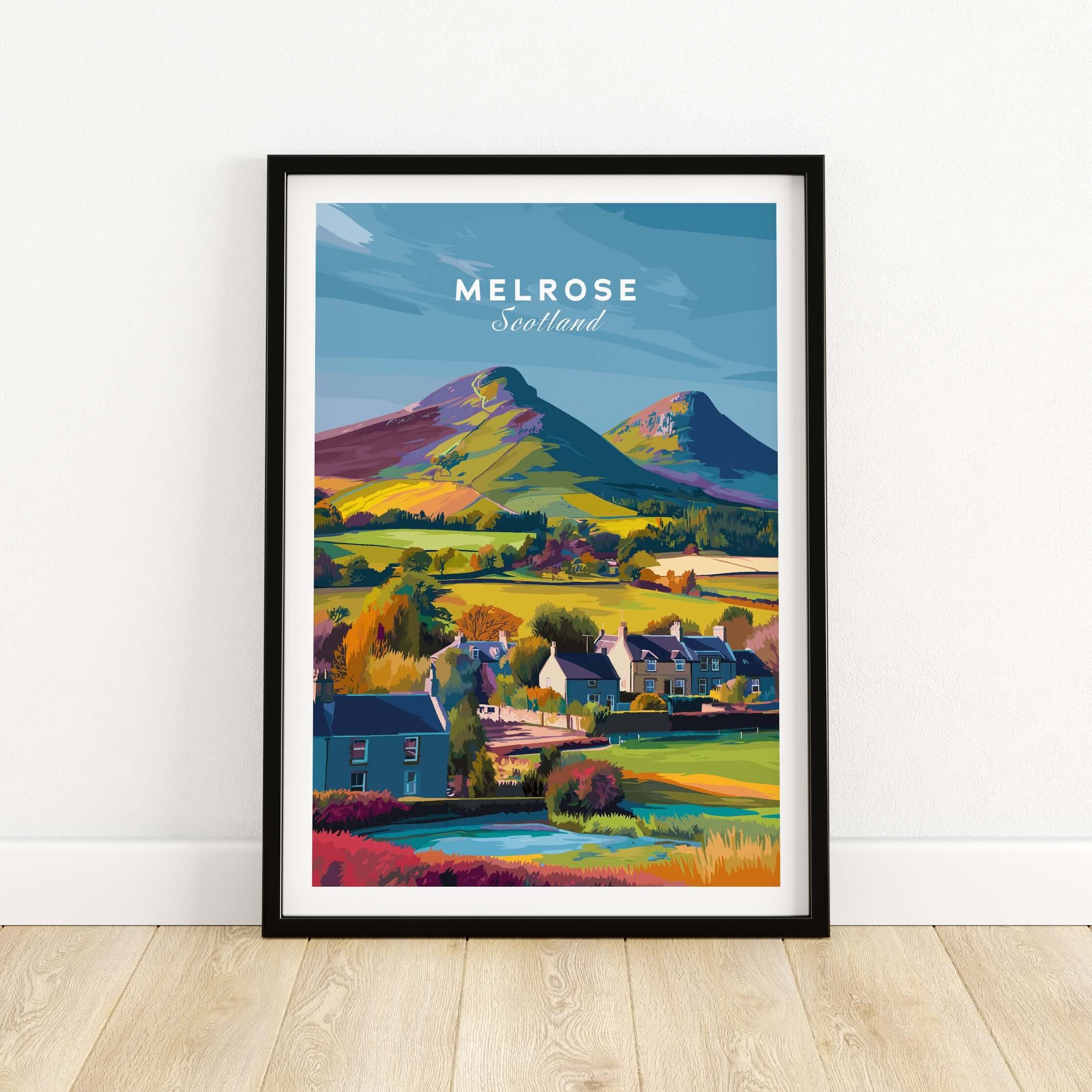 Melrose Scotland Village Travel Print Eildon Hills Poster Scottish Borders Wall Art showcasing vibrant hills and village houses.