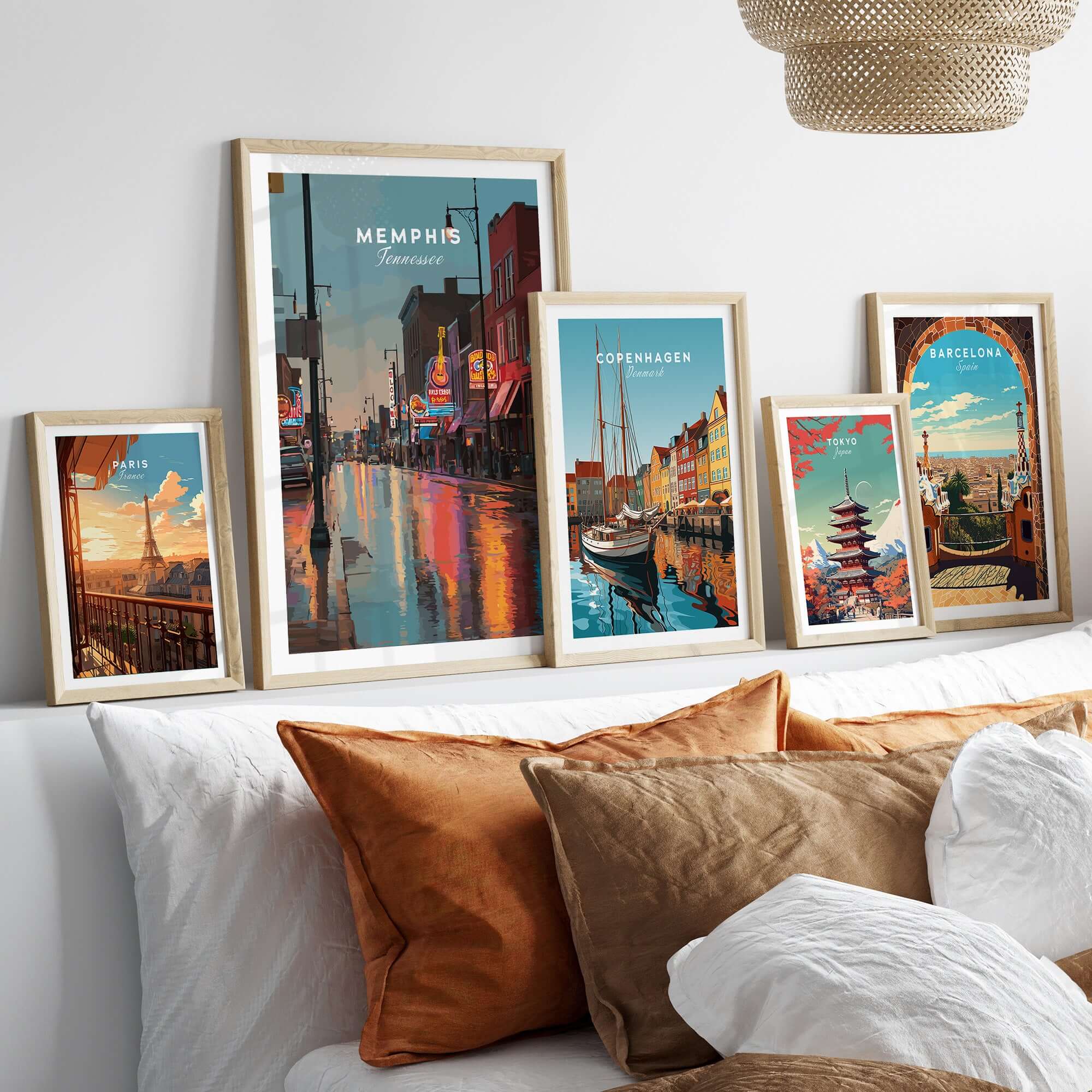 Memphis Tennessee Beale Street Dusk Poster - Music City Art Print displayed with other art prints on a stylish couch.