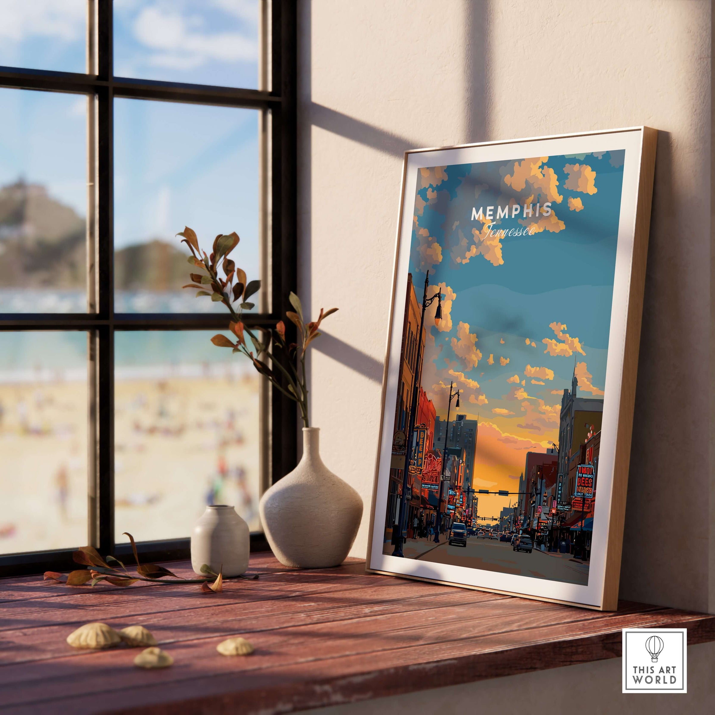 Memphis Tennessee Travel Poster -  Street Scene Wall Art - Historic Building Poster displayed on a wooden table near a window.