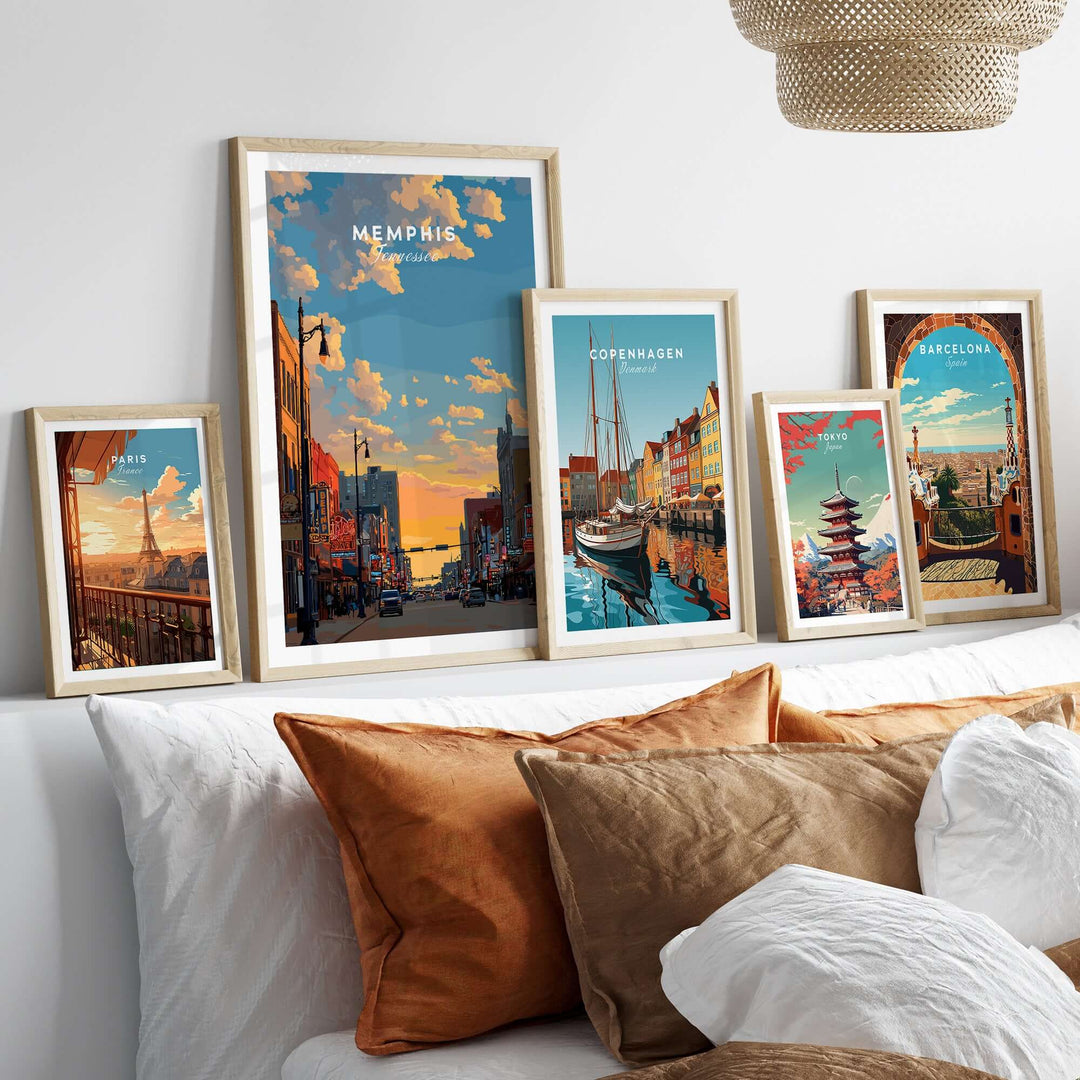 Memphis Tennessee travel poster among framed cityscape wall art, showcasing iconic architecture and vibrant colors.