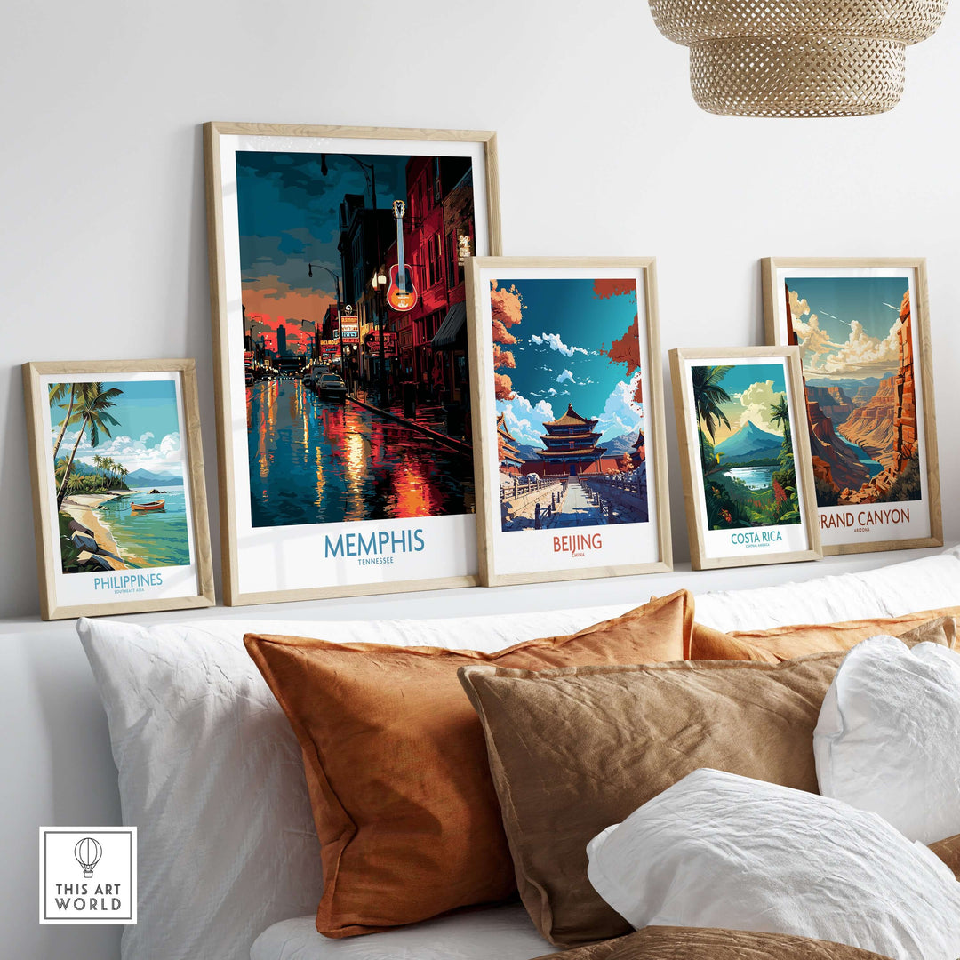 Vibrant travel posters displayed on a shelf, featuring Memphis, Beijing, Costa Rica, Grand Canyon, and Philippines artworks.