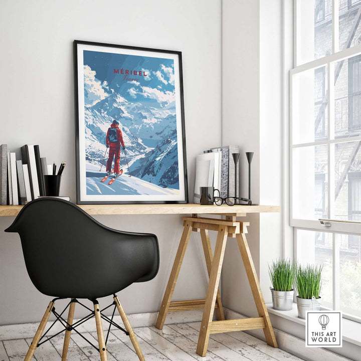 Meribel travel poster featured in a stylish home office setting, showcasing a skier against a scenic mountain backdrop.