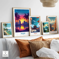 Miami Wall Art Print and travel posters showcasing vibrant cityscapes and landscapes on a stylish shelf.