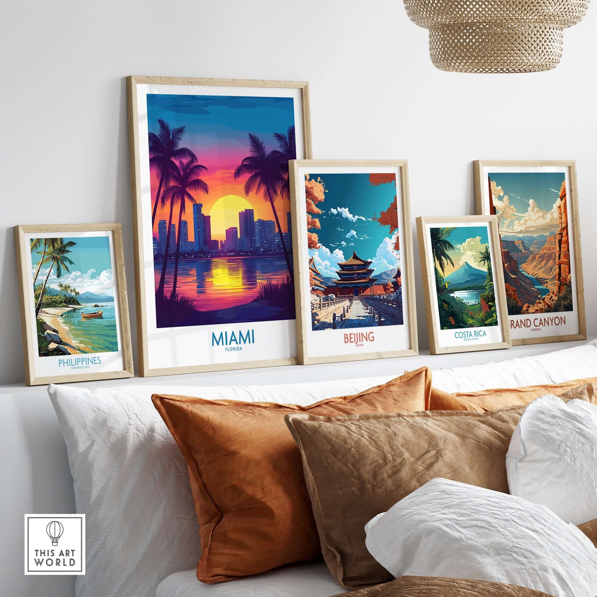 Miami Wall Art Print and travel posters showcasing vibrant cityscapes and landscapes on a stylish shelf.