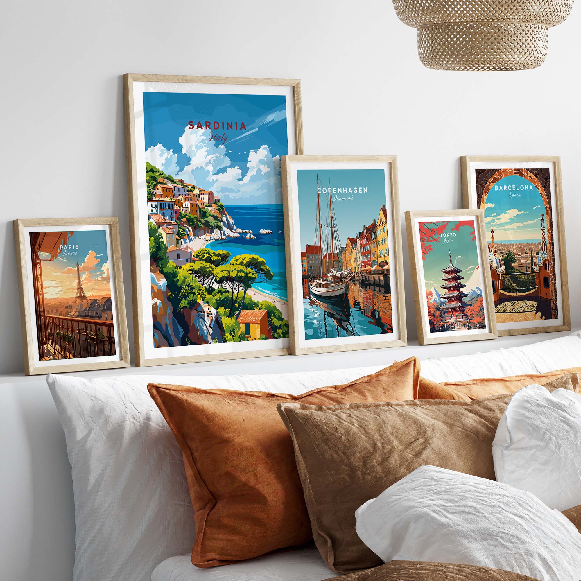 Modern Sardinia Poster Captivating Views of Italy´s Scenic Island displayed on a cozy bed with decorative pillows.