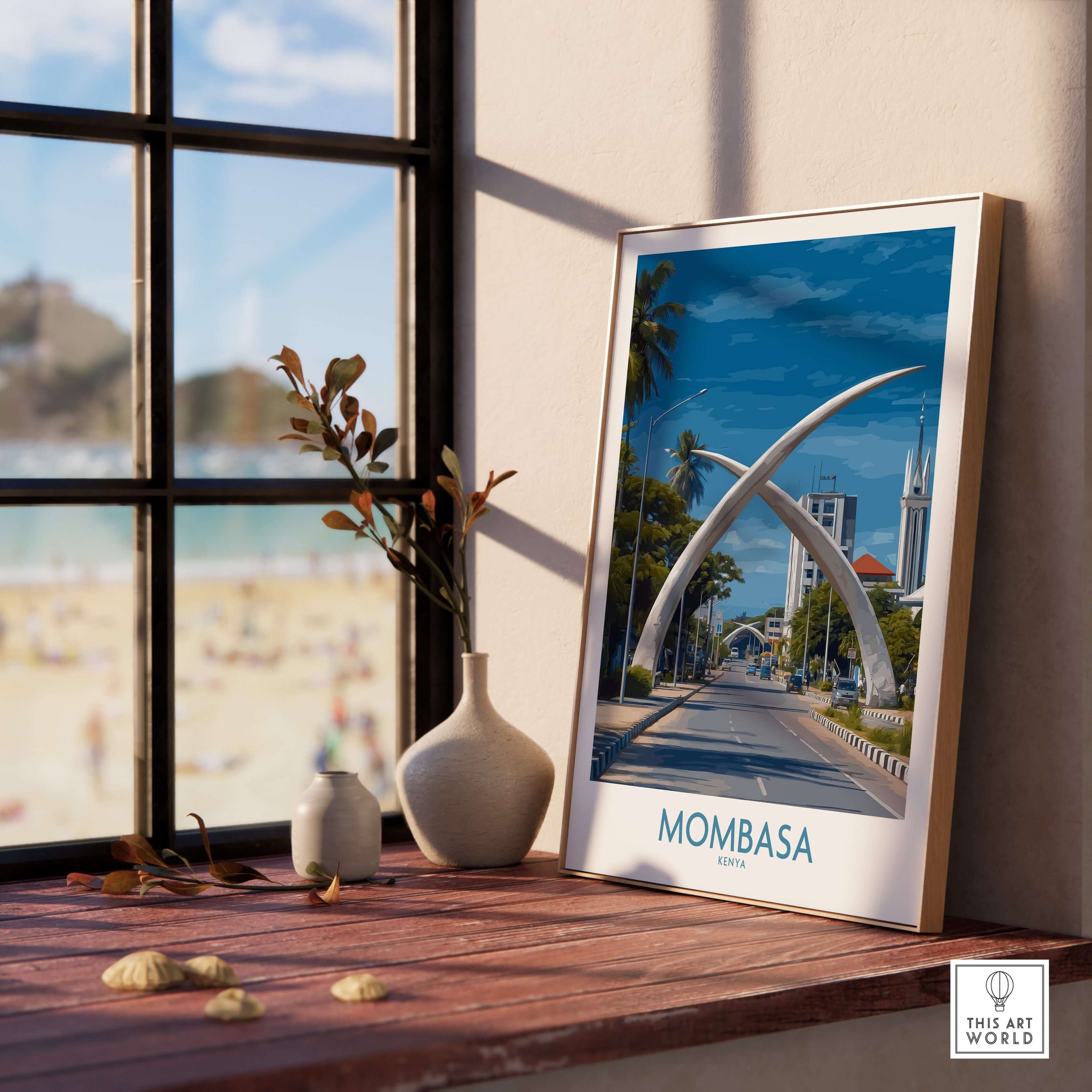Mombasa Kenya Elephant Tusks Poster - African Landmark Wall Art displayed on a wooden shelf with a beach view.
