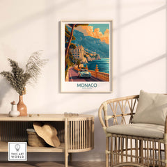 Vintage Monaco Print showcasing a sunset view of the Mediterranean coast in an elegant living room setting.