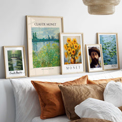 Monet Banks of the Seine Vétheuil River Landscape Art Print Poster displayed among other Monet artworks on a cozy shelf.