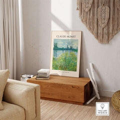 Monet Banks of the Seine Vétheuil River Landscape Art Print Poster displayed in a serene living room setting.
