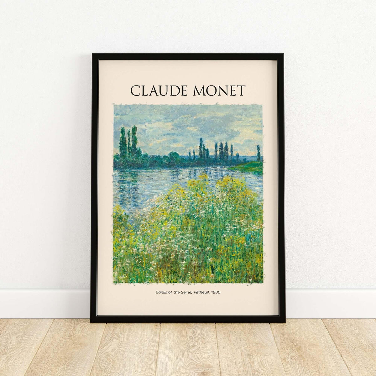 Monet Banks of the Seine Vétheuil River Landscape Art Print Poster framed artwork on a wooden floor.